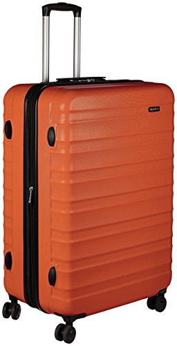 Amazon Basics - Valigia Trolley rigido con rotelle girevoli, 78 cm, Arancione