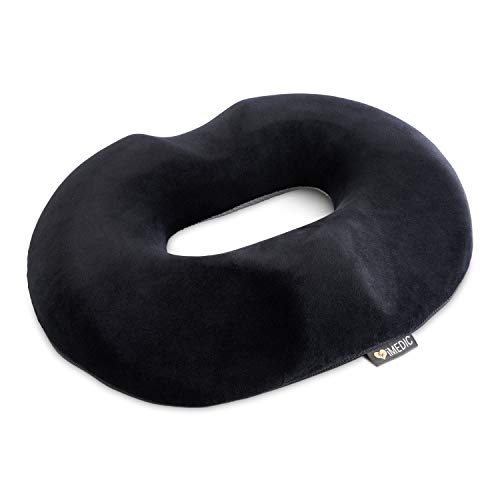 iMedic - Cuscino a ciambella, in memory foam, con rivestimento deluxe, sollievo per emorroidi, mucchi, coccigi o dolori post-natali, auto, sedia a rotelle, ufficio, peluche nero